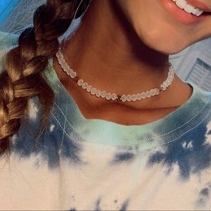 White beaded choker with gold stars